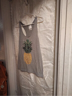 Jerry Leigh sequinned pineapple on a grey racerback Tank